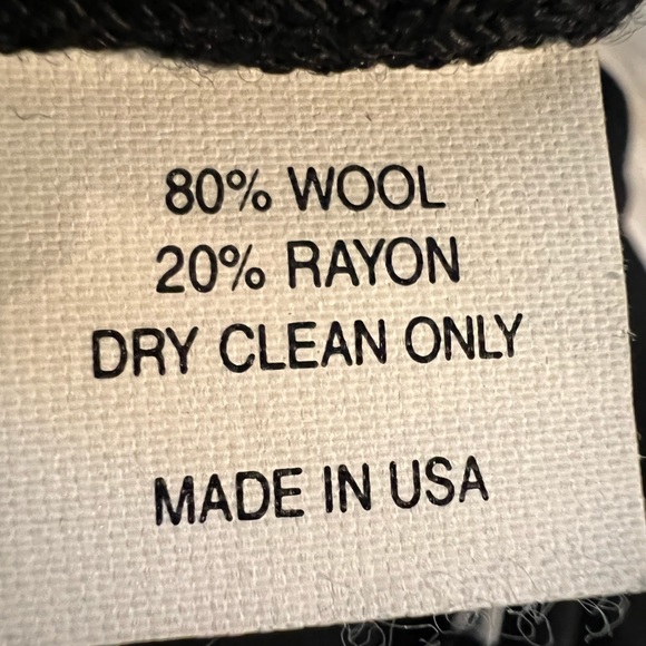 ELANA Black sleeveless knit dress with black shoulder bow with rhinestones. - Picture 6 of 6